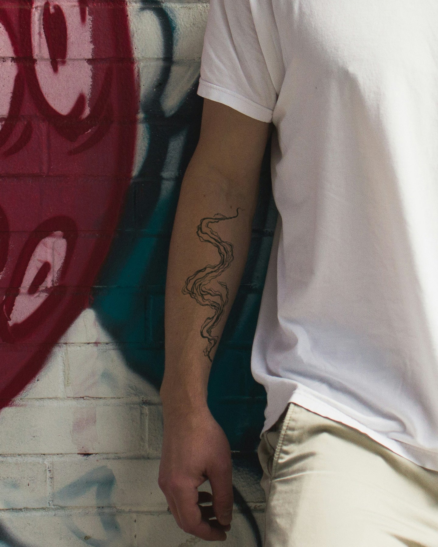 Echoes in Fluid Lines temporary tattoo