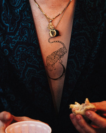 Floating Cheetah temporary tattoo