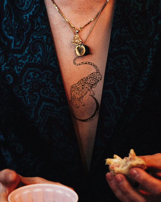 Floating Cheetah temporary tattoo