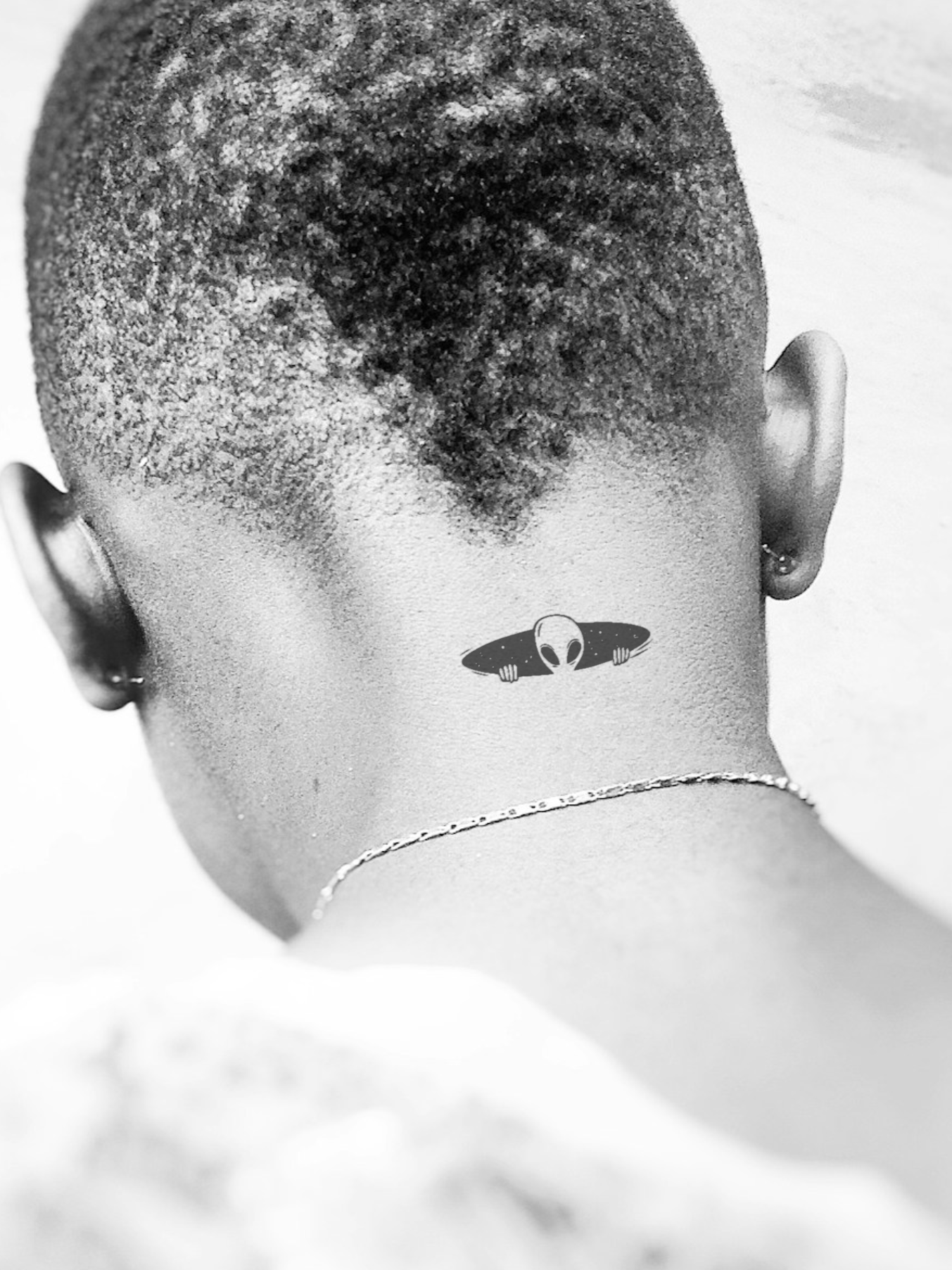 Lurking Alien temporary tattoo