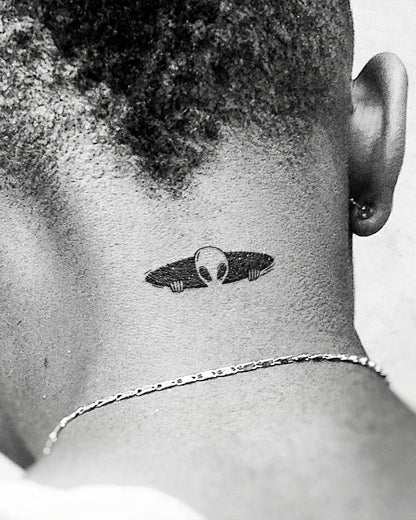 Lurking Alien temporary tattoo