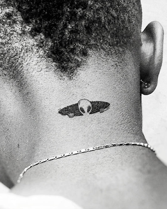 Lurking Alien temporary tattoo