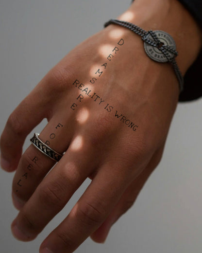 Reality Is Wrong (Right Hand) temporary tattoo